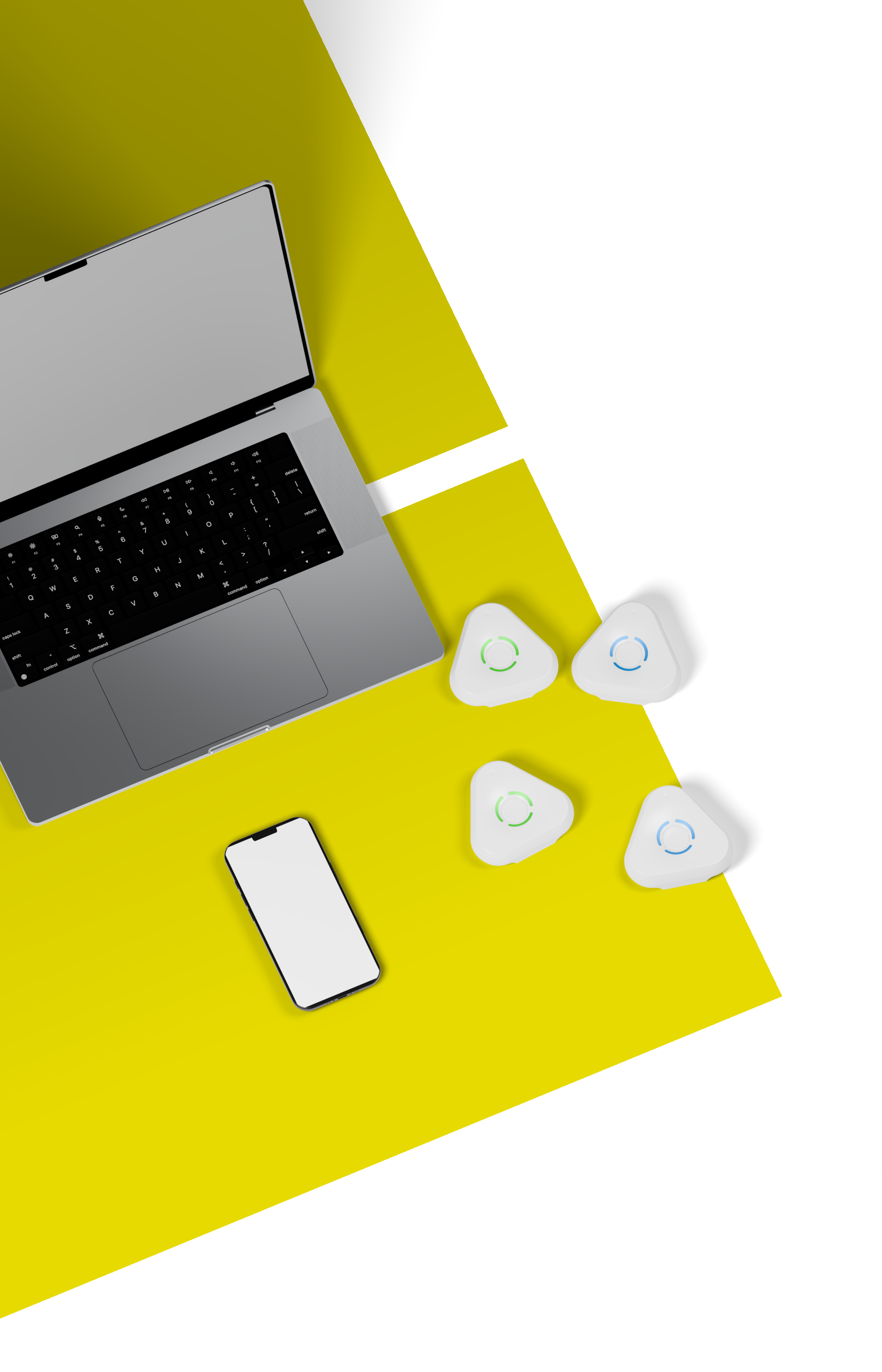 A Space Gray laptop, a black-framed phone and four lying Estimote UWB anchors on yellow and white panels